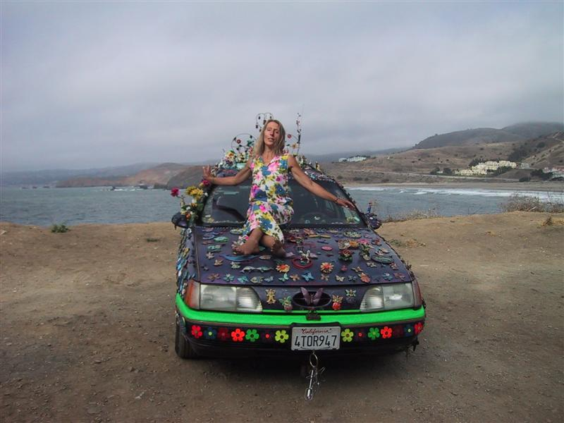 Illustration for article titled Groovalicious Purple Princess Of Peace Art Car Falls On Hard Times, Faces Crusher